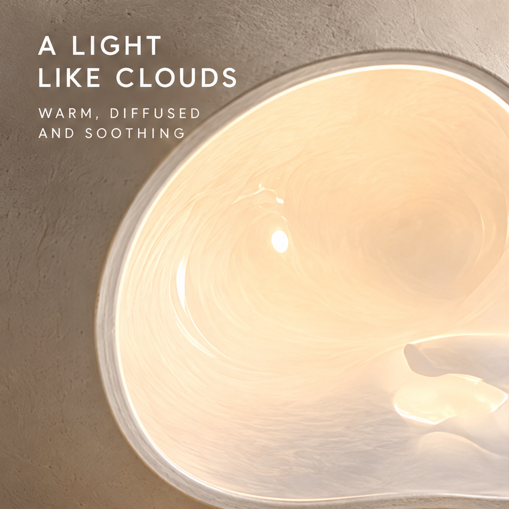 Close-up of the lamp's warm illuminated inset beneath A Light Like Clouds.