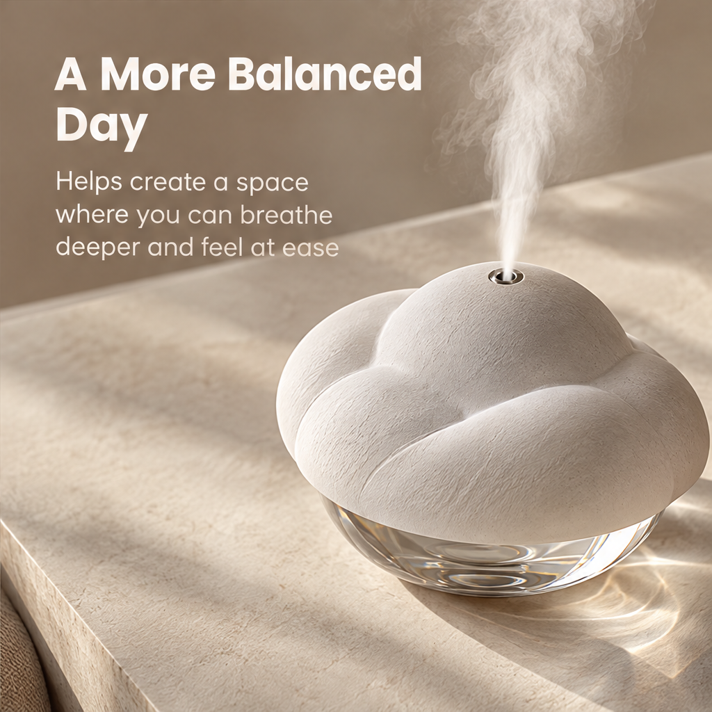 Angled overhead view of the cloud-shaped humidifier beneath A More Balanced Day.